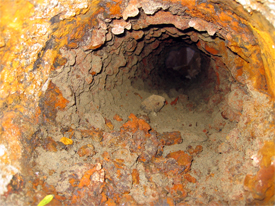 closeup of turberculated water main